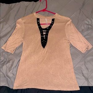 Beige top with black laced design